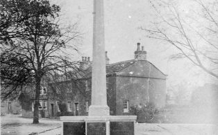 Photograph of Long Preston war Memorial in snow