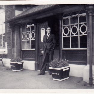 Photograph of Ian Sarginson, clerk at Horton station dated 1951