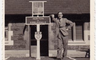 Photograph of Ian Sarginson, clerk at Horton station dated 1952