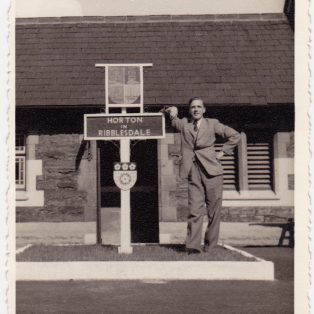 Photograph of Ian Sarginson, clerk at Horton station dated 1952