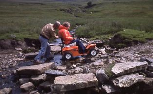 Being given a helping hand across a ford in Littondale