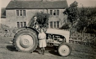 Elizabeth Clay, nee Bowdin with father and tractor