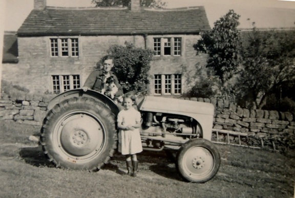 Elizabeth Clay, nee Bowdin with father and tractor