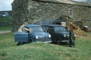 Jack Myers with colleague and cars