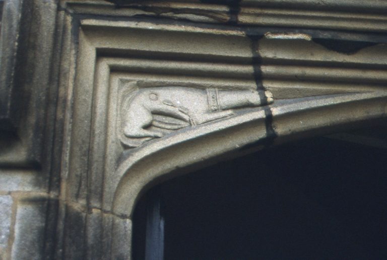 Skipton Castle: lintel carved with stylised talbot hunting dog